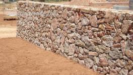 Busco oficial de paredes de piedra